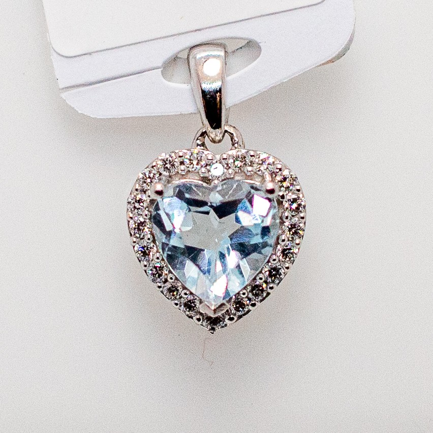 Pendentif or 750 topaze bleue et diamants